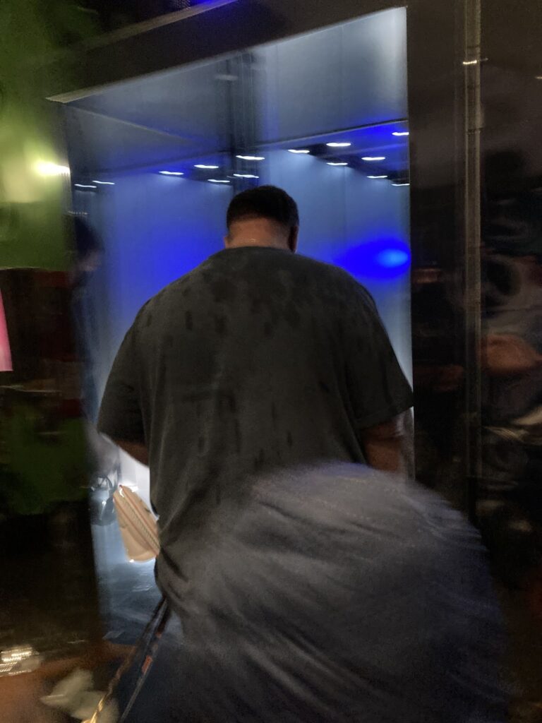 A man walking in to an establishment