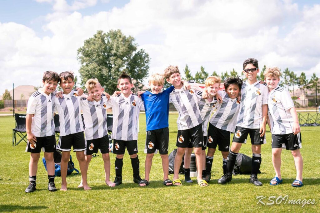 A group photo of young football players