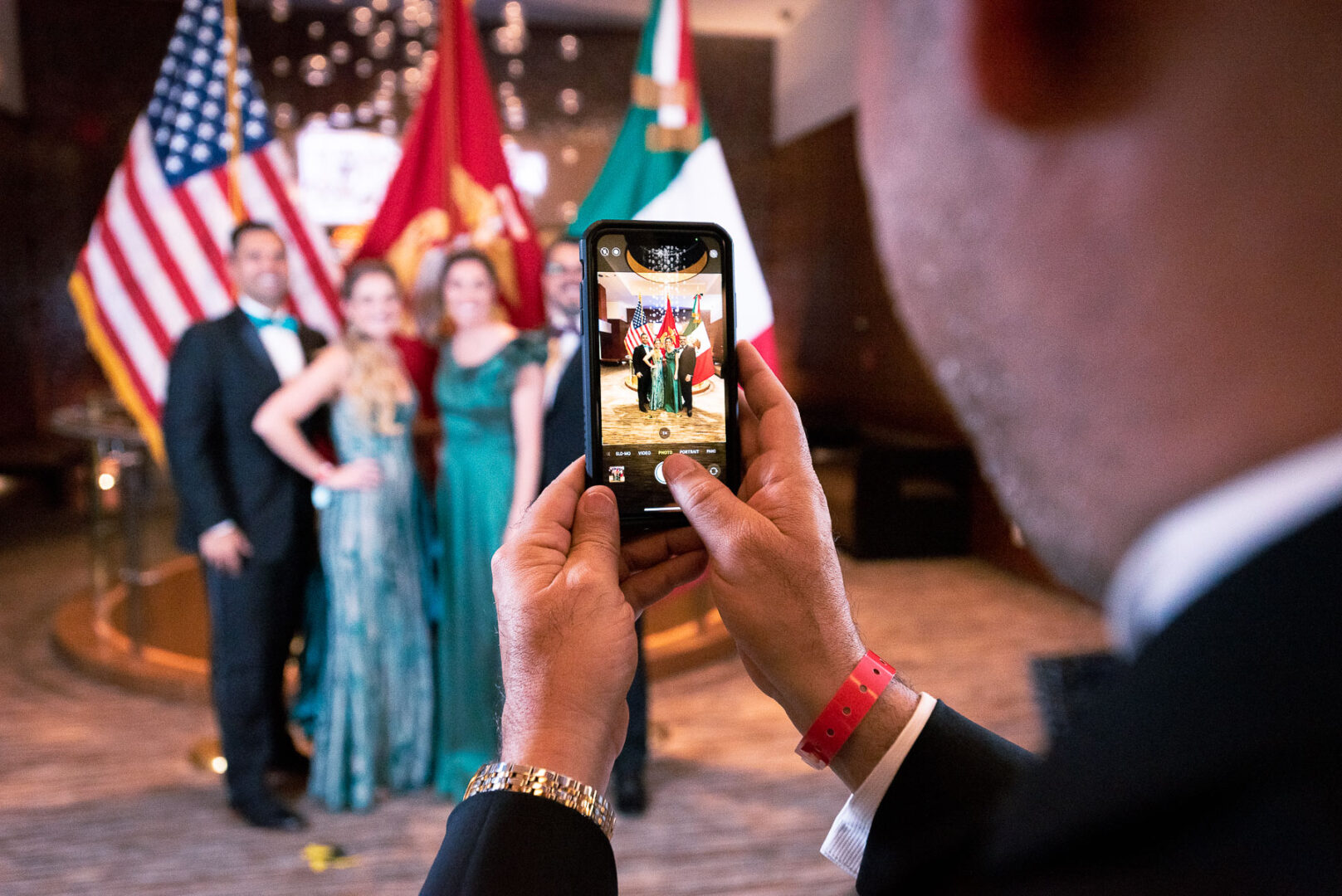 A man taking a picture using a smartphone