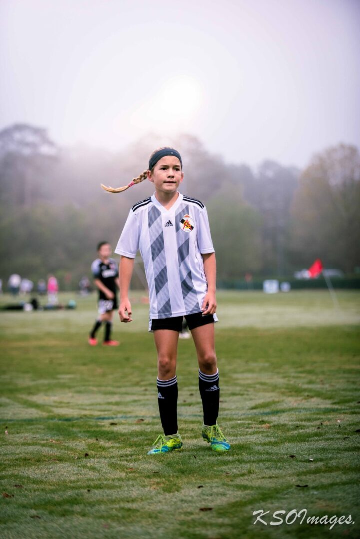 A young soccer player on the field