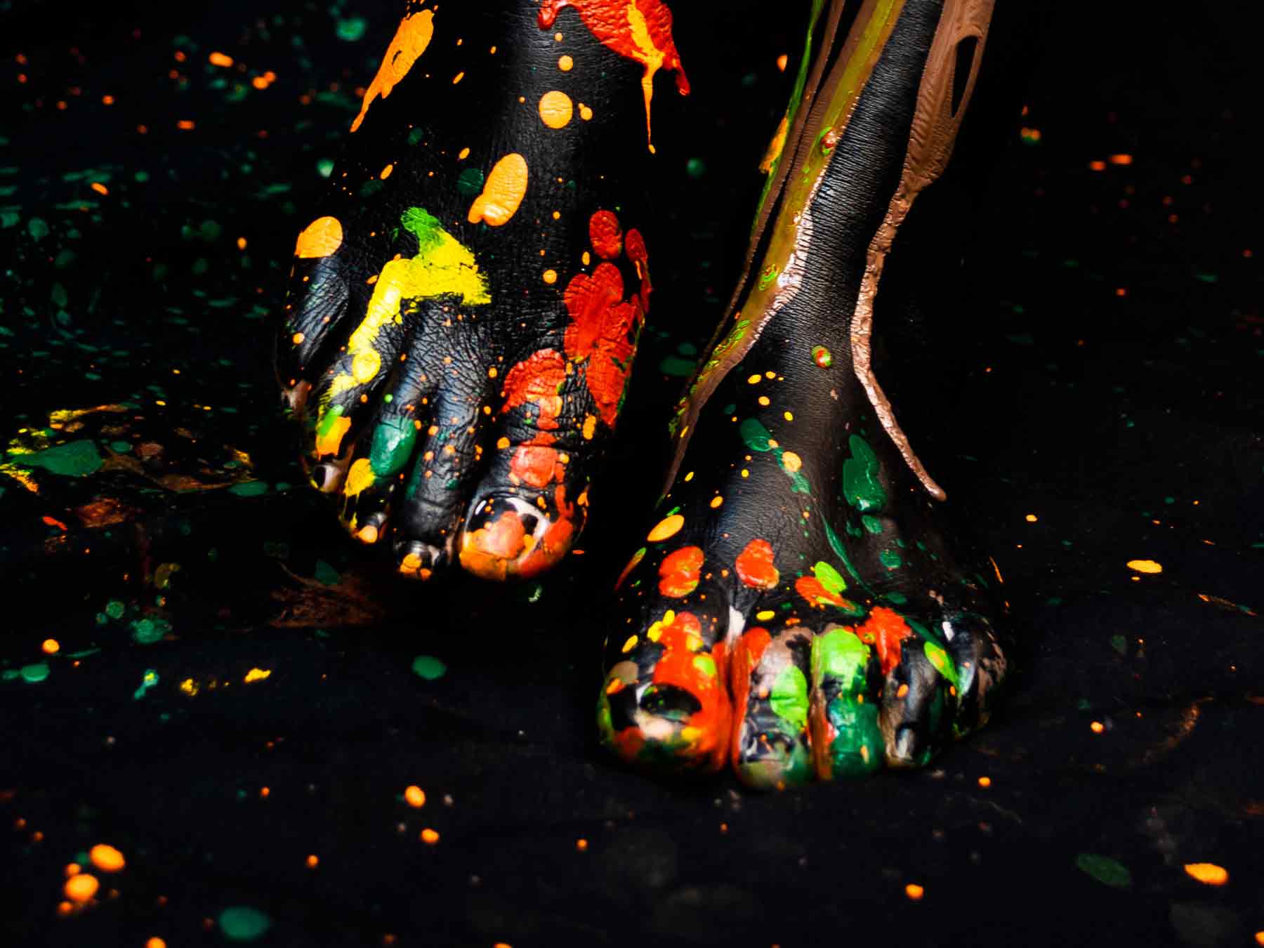 Feet covered in body paint