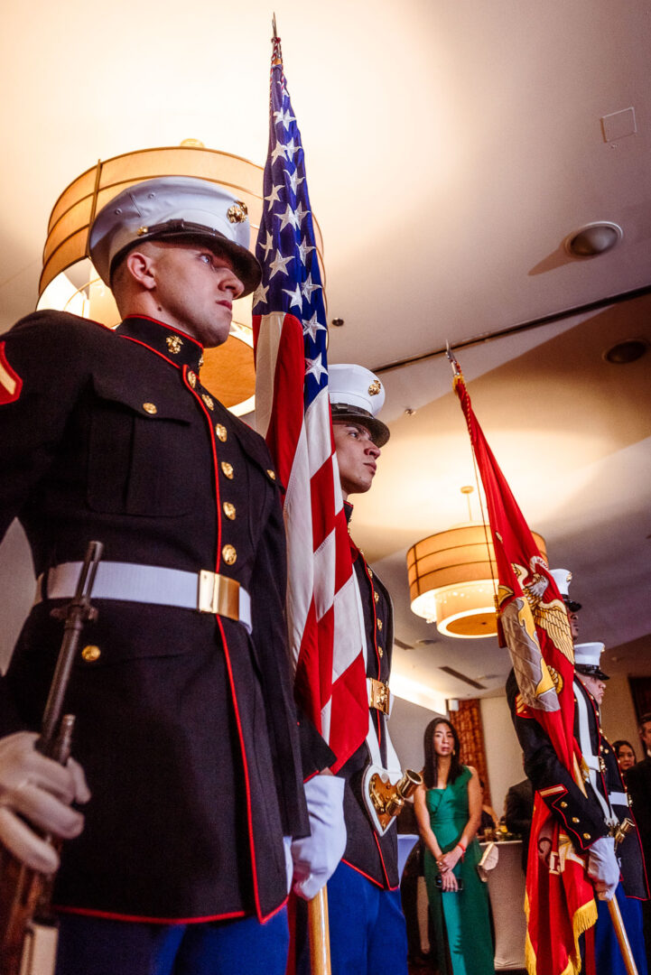 Men in uniform standing straight